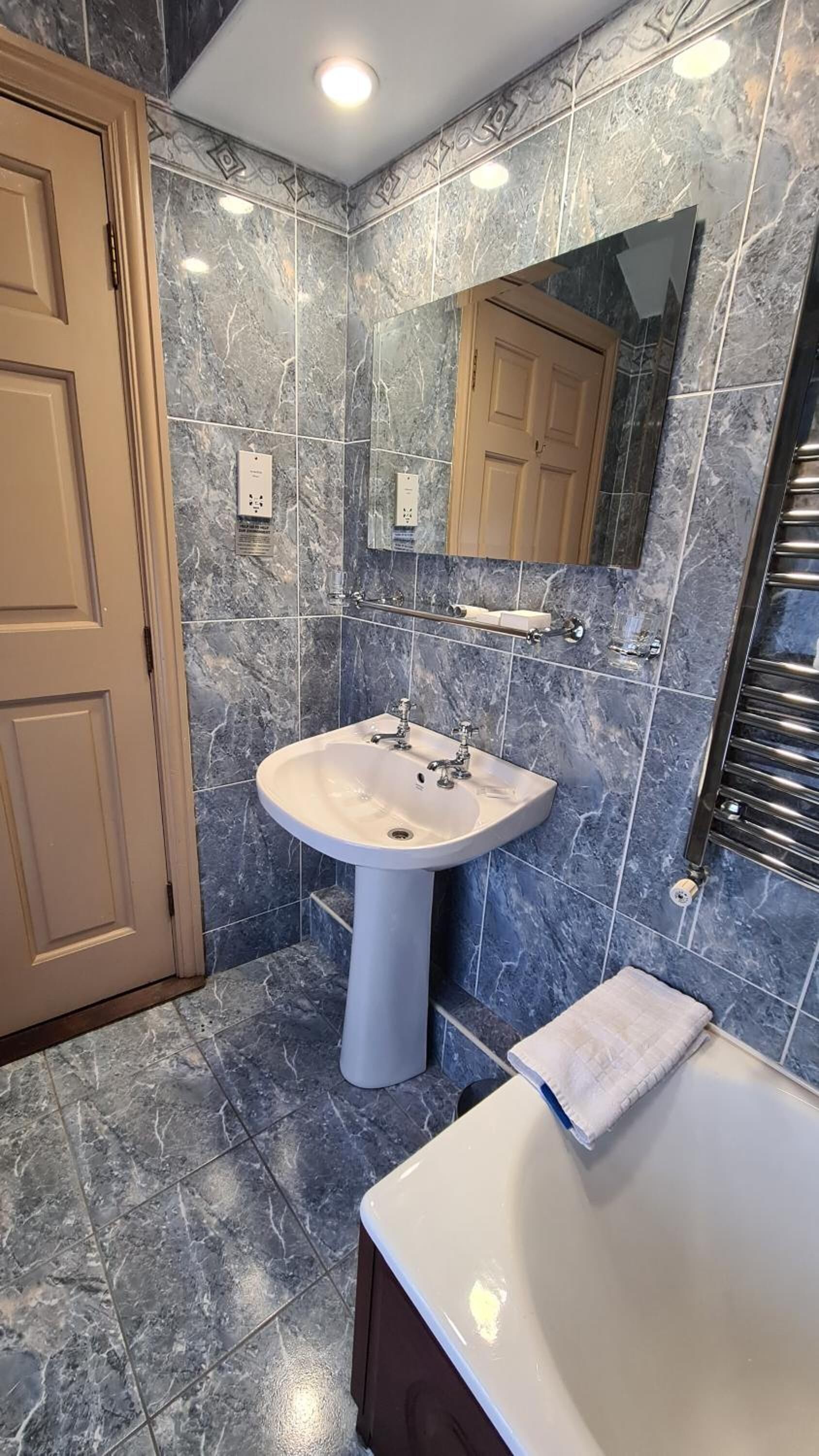 bathtub, free toiletries, hair dryer, towels