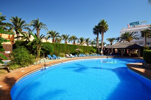 Outdoor pool, pool umbrellas, pool loungers