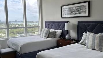 2 Bedroom Coastal Suite, 1 King, 2 Double beds, Premium Sofa bed, Ocean view, Balcony (1802) | 2 bedrooms, premium bedding, in-room safe, desk