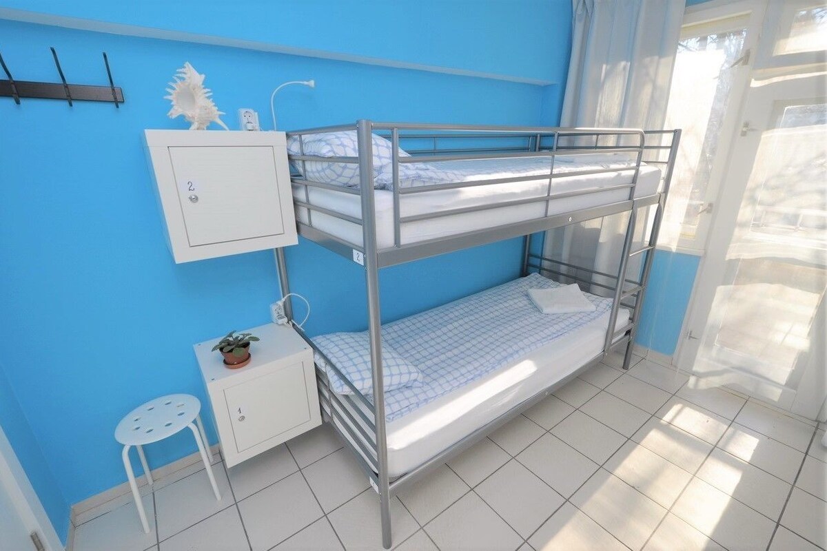 Chambre Quadruple Économique, salle de bains commune