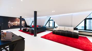 Deluxe Apartment, 2 Bedrooms, Private Bathroom, City View | Living area | Flat-screen TV