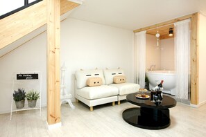 Appartement Duplex | Coin séjour | Télévision à écran plat