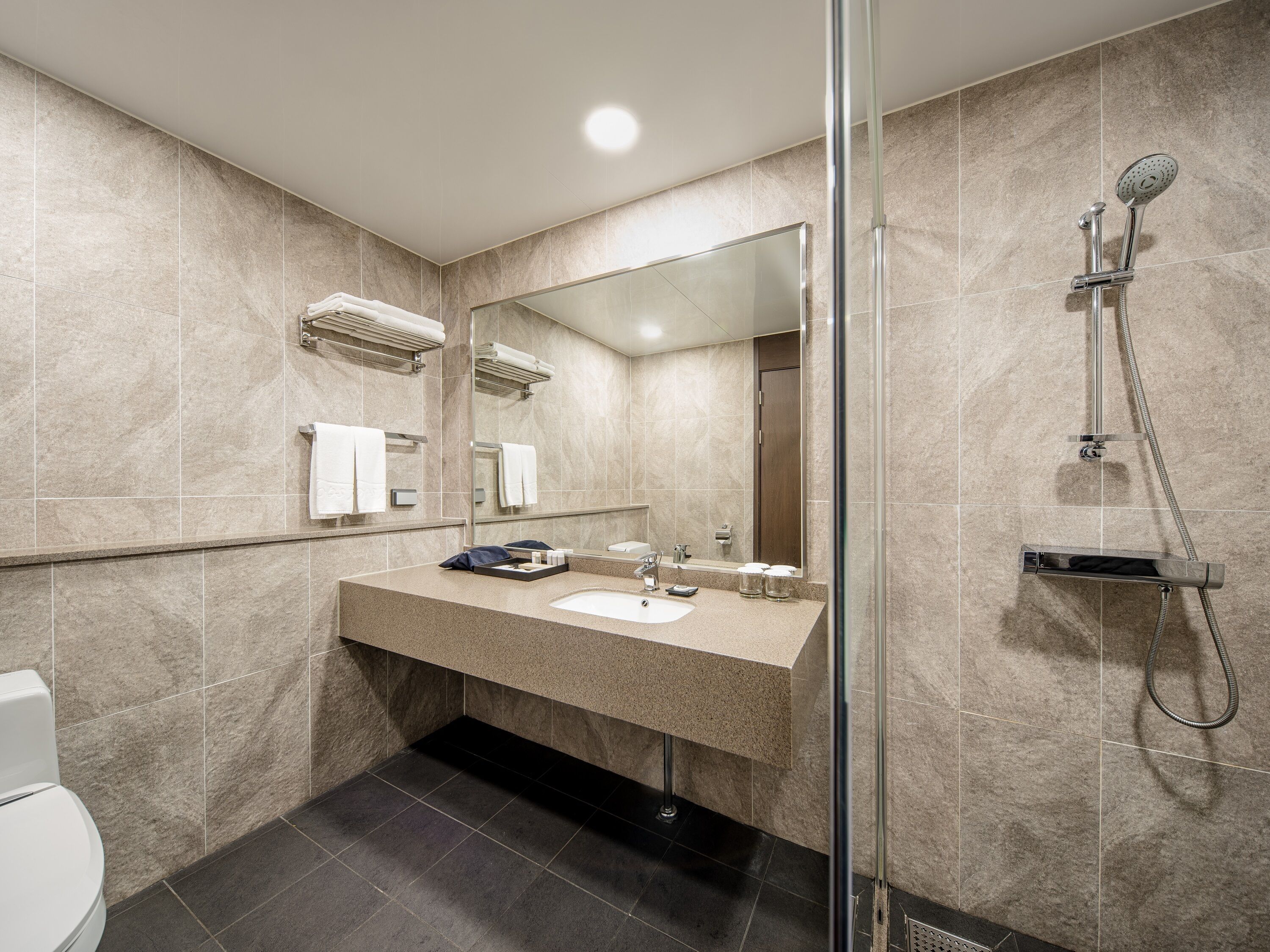 hair dryer, bathrobes, slippers, bidet