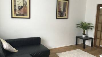 House, 4 Bedrooms | Living area | Flat-screen TV