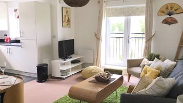 Apartment, 2 Bedrooms | Living area | Flat-screen TV