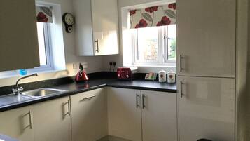 Apartment, 2 Bedrooms | Private kitchen | Full-size fridge, microwave, oven, stovetop