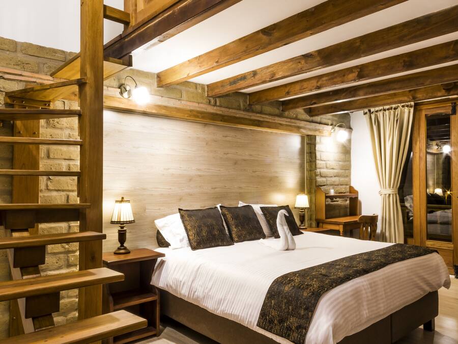 Premium bedding, down comforters, pillowtop beds, desk