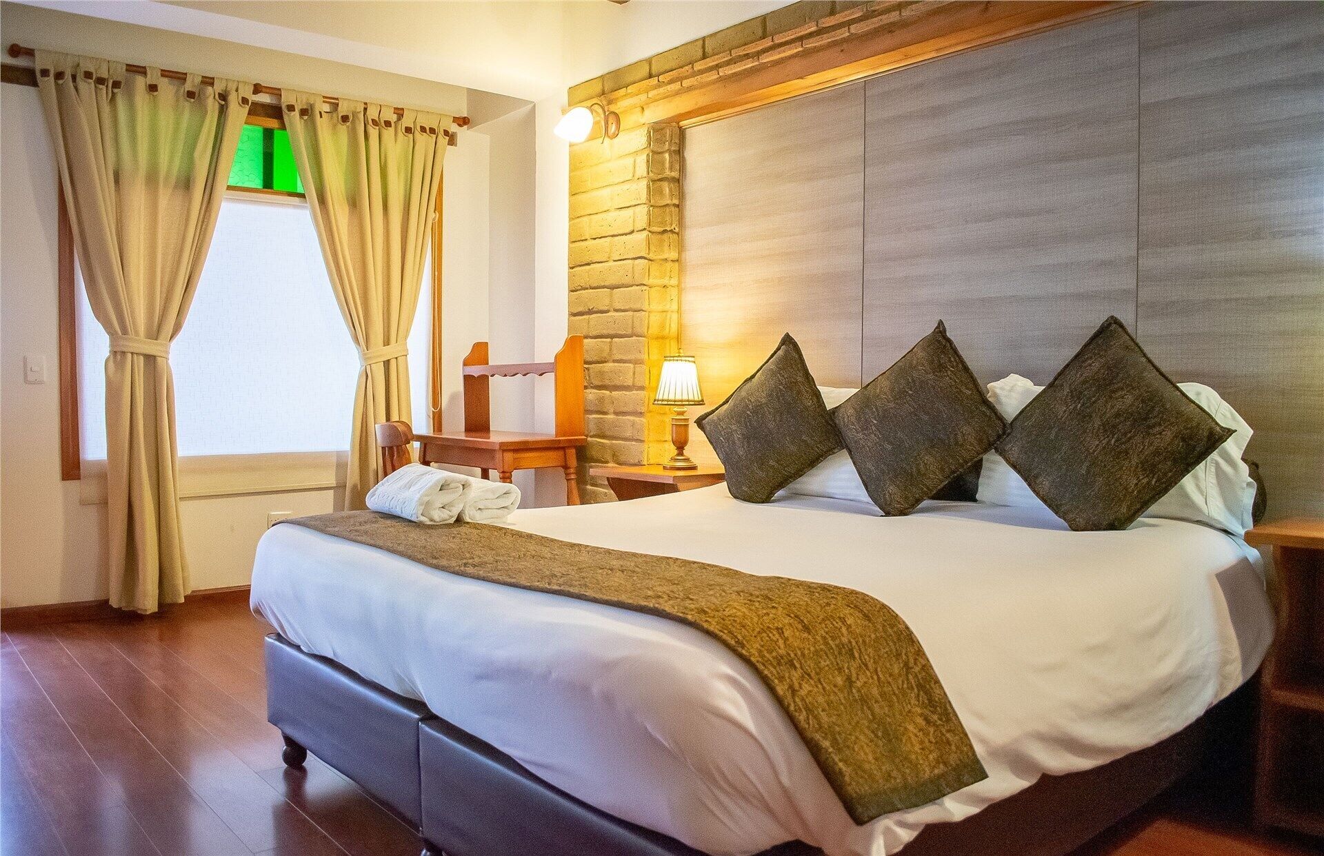 Premium bedding, down comforters, pillowtop beds, desk