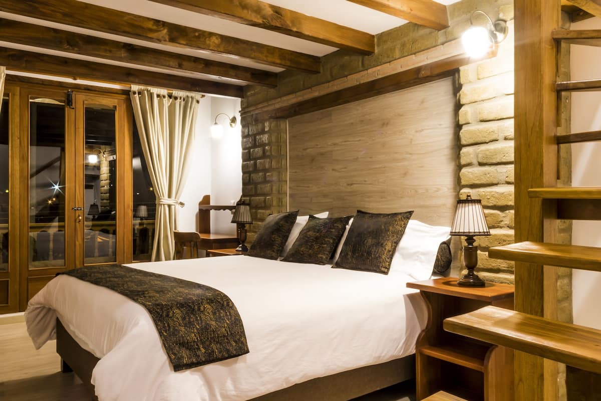 family double or twin room, multiple beds, balcony, mountain view (jardinerito) | 1 bedroom, premium bedding, down duvets, pillow-top beds