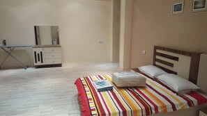 Family Apartment, 2 Bedrooms, Kitchen, Courtyard View | Living area | Flat-screen TV - Villa Floor 2 Beds Fully furnished Apt (Baku)