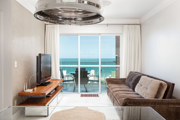 Room, 3 Bedrooms | Living area | Flat-screen TV, DVD player