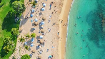 On the beach, sun-loungers, beach towels