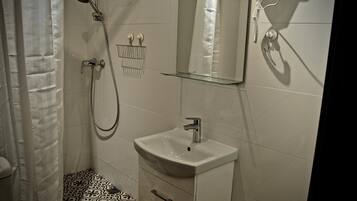 Shower, free toiletries, hair dryer, towels