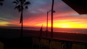 On the beach, sun-loungers, beach towels