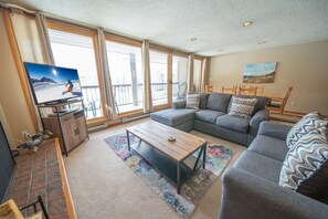 Design Condo, 2 Bedrooms, Balcony, Lake View (Lenawee 1738) | Living area | Flat-screen TV, fireplace, DVD player