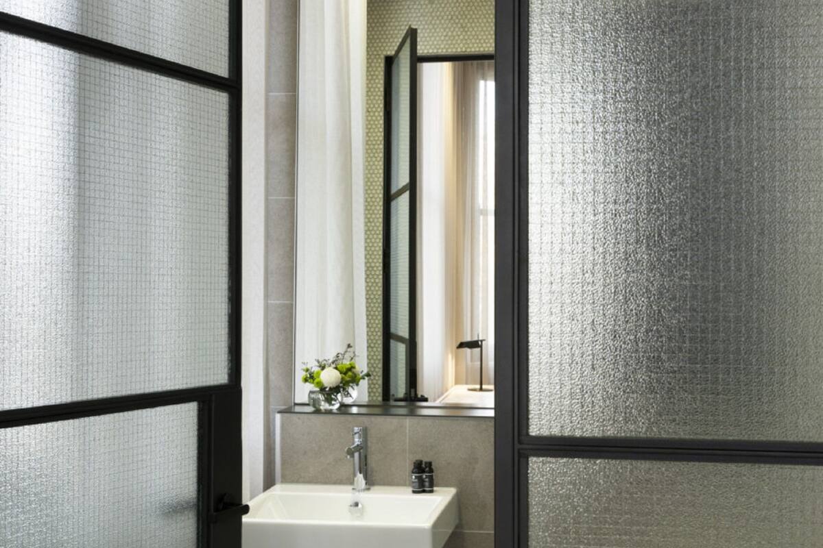 shower, designer toiletries, hair dryer, bathrobes