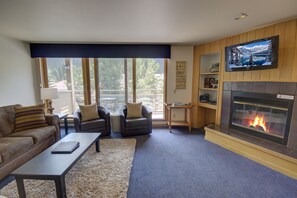 Signature Condo, 2 Bedrooms, Balcony, Mountain View (Ski Run 202) | Living area | Flat-screen TV, fireplace, DVD player, iPod dock - Ski Run 202 (Keystone)