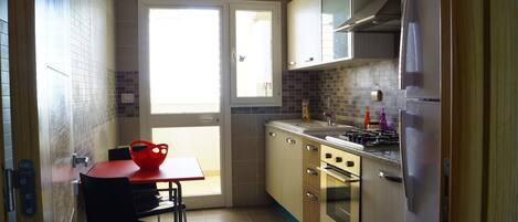 Apartment, 1 Bedroom | Private kitchen | Full-sized fridge, microwave, oven, stovetop