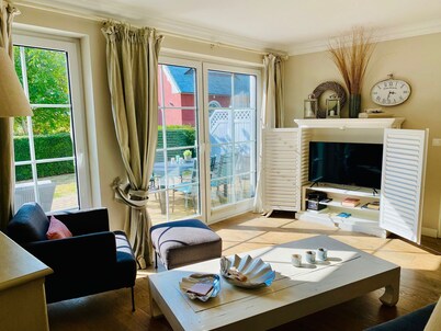 Exclusivo apartamento con jardín y chimenea.