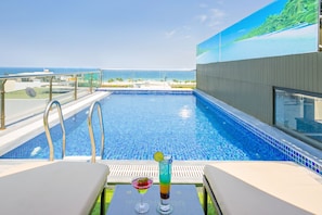 Outdoor pool, pool loungers