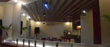 Breakfast, lunch served; local and international cuisine, garden views