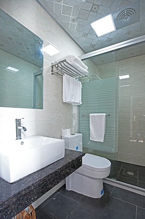 Shower, free toiletries, hair dryer, slippers