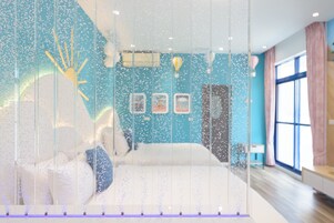 Individually decorated, desk, blackout curtains, rollaway beds