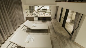 A modern spa room with two reclining chairs, a vanity with mirrors, and a view of a staircase. - Art Mon Zen Kyoto (Kyoto)