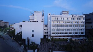 A hotel with a modern design, featuring a prominent 'Chanakya' sign on the building. - Hotel Chanakya (Patna)