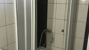 Shower, free toiletries, hair dryer, slippers