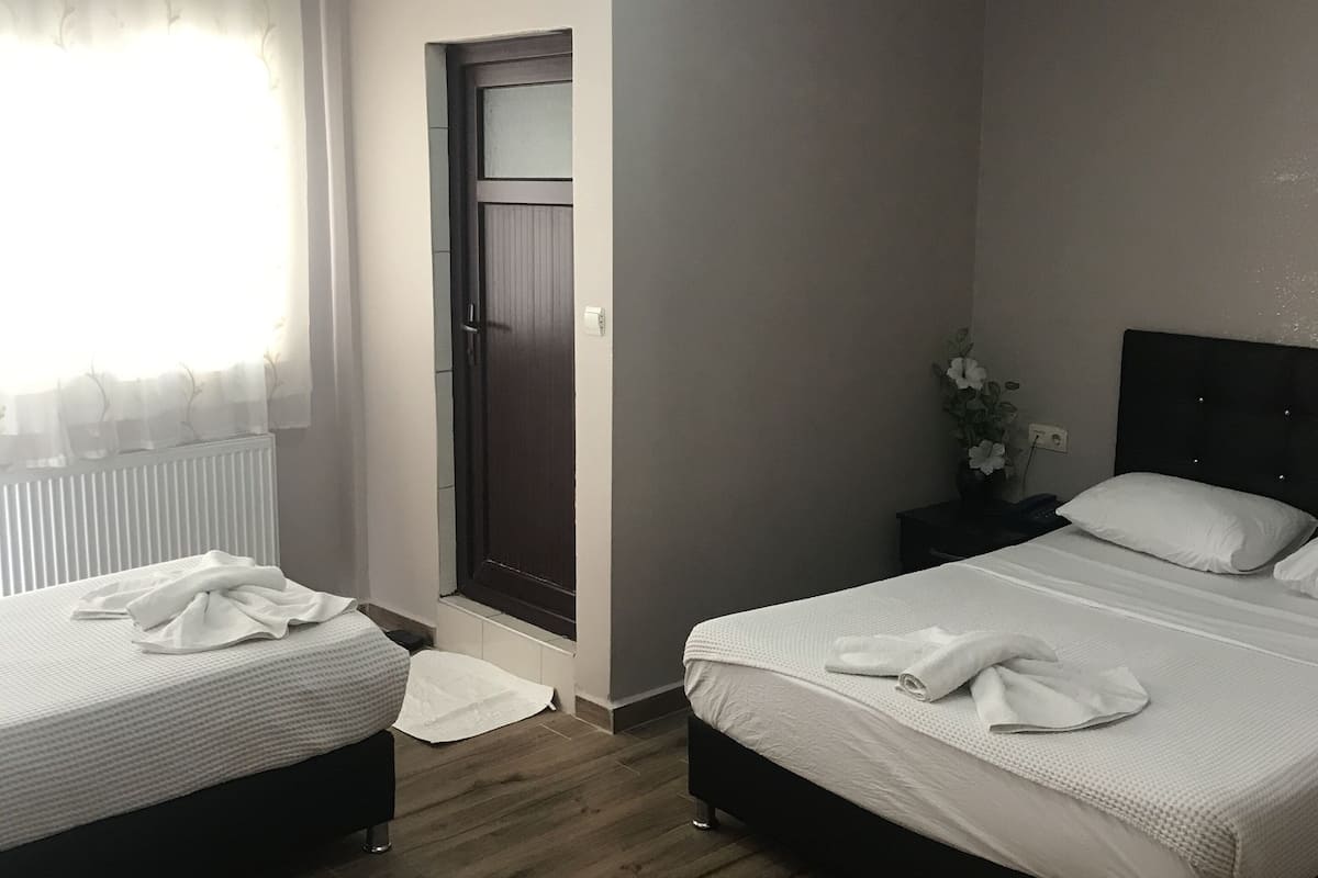 Standard Triple Room | Premium bedding, desk, blackout drapes, soundproofing
