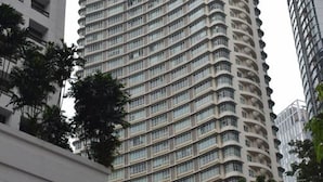 A high-rise building with multiple balconies and a uniform facade. - KLCC Parkview Residence Suites (Kuala Lumpur)