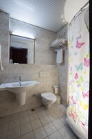 Shower, free toiletries, hair dryer, slippers