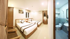 Quadruple Room, City View | Minibar, desk, soundproofing, free WiFi - New Sky Hotel (Da Nang)