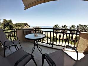 Estudio, cocina, mirando al mar | Wifi gratis y ropa de cama
