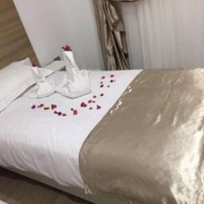 Sábanas italianas Frette, cubrecamas y colchones Select Comfort 