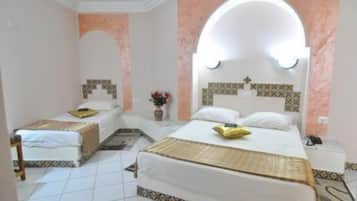 Triple Room | Frette Italian sheets, down comforters, Select Comfort beds, desk