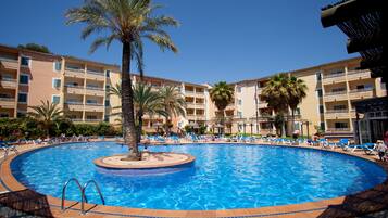 Outdoor pool, pool umbrellas, pool loungers