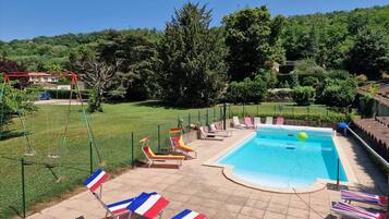 Seasonal outdoor pool, pool umbrellas, sun loungers