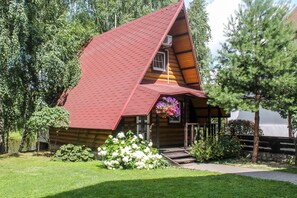 Cottage | Minibar con snack e bevande gratuite, una cassaforte in camera