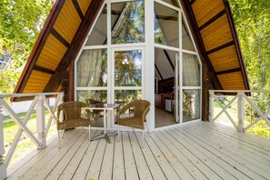 Cottage | Minibar con snack e bevande gratuite, una cassaforte in camera