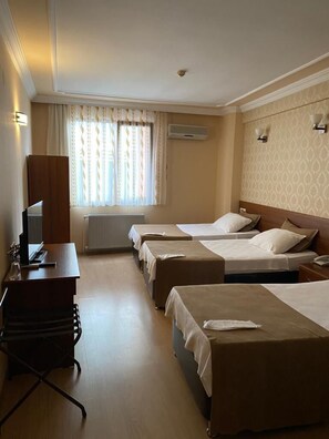 Standard Triple Room | Minibar, in-room safe, desk, soundproofing - Karayel Hotel (Trabzon)