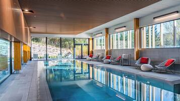 Indoor pool, seasonal outdoor pool, pool umbrellas, pool loungers