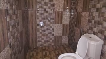 Shower, free toiletries, hair dryer, slippers