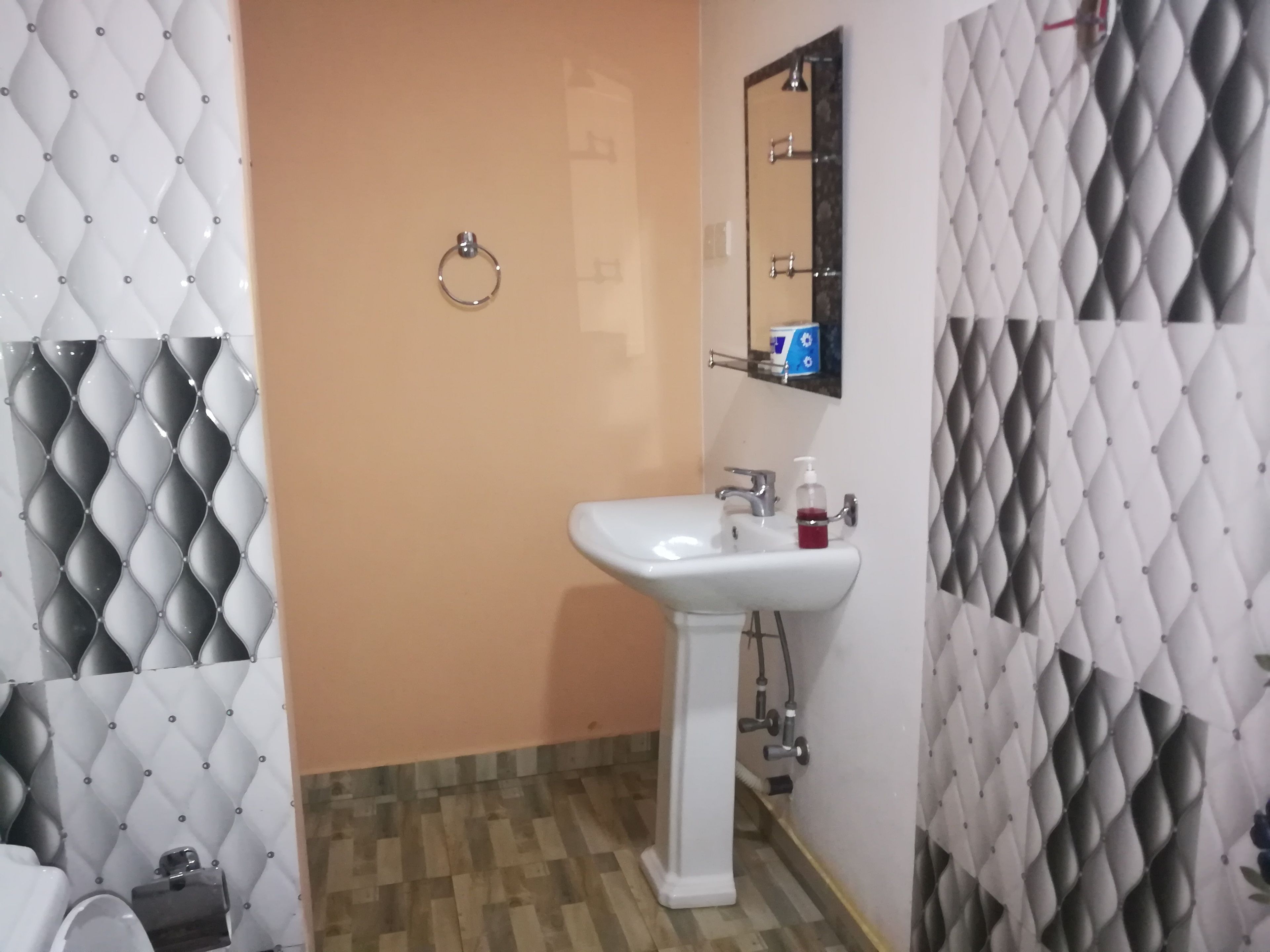 Shower, free toiletries, hair dryer, slippers