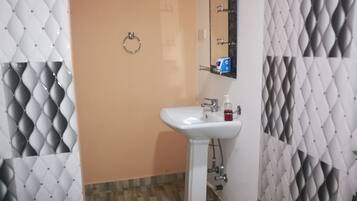Shower, free toiletries, hair dryer, slippers
