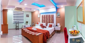 Familiesuite, 2 soverom, hageutsikt | Italienske Frette-laken, sengetøy av topp kvalitet og safe på rommet