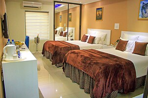 Executive Twin Room, Garden View | Frette Italian sheets, premium bedding, in-room safe, desk