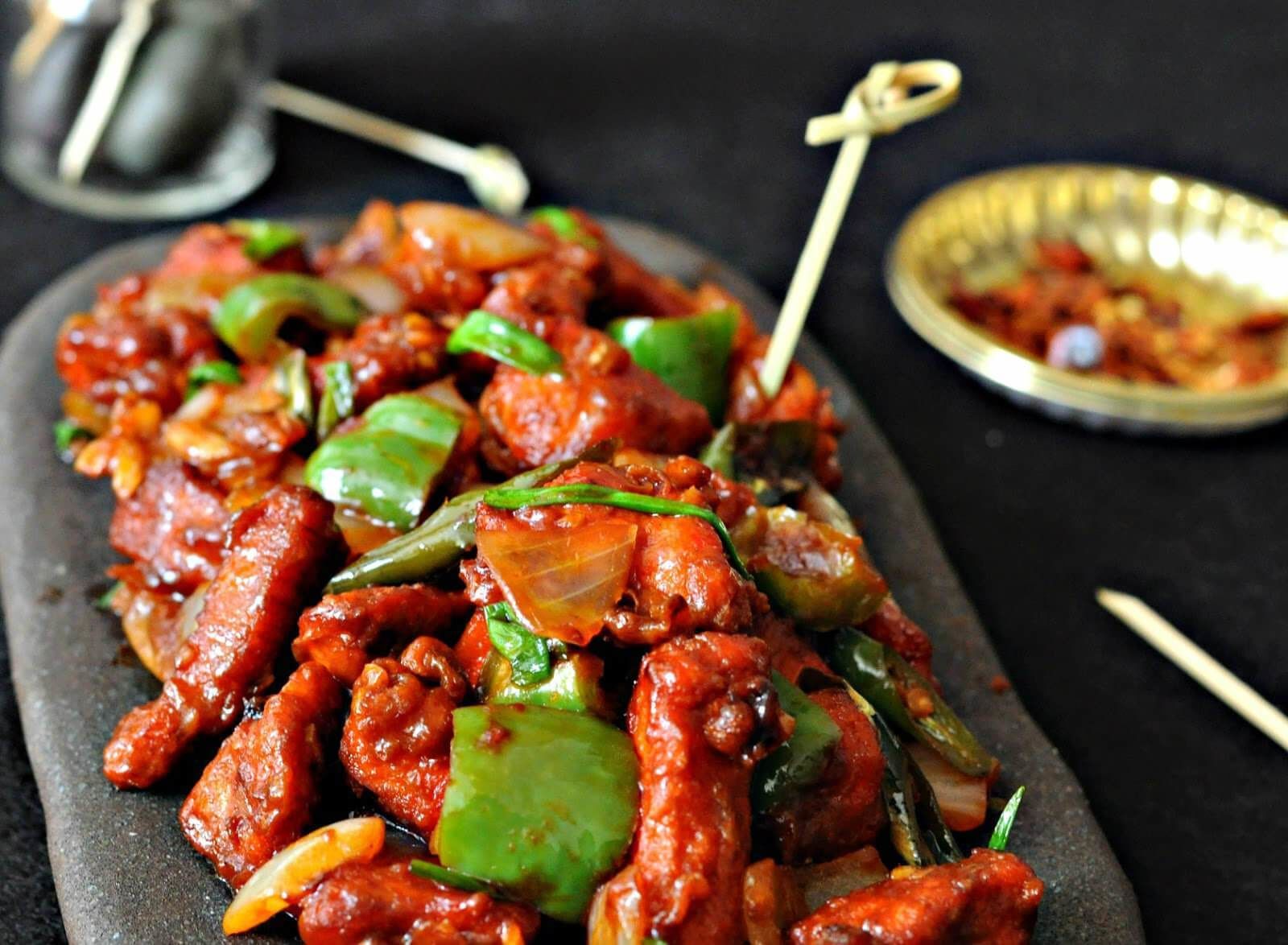 A dish of stir-fried meat with vegetables.