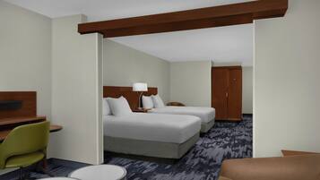Una habitación de hotel con una cama, dos mesitas de noche, un escritorio, una silla y un armario.